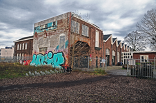 846288 Gezicht op de voormalige wagenmakerij op het werkplaatsterrein van de N.S. aan de 2e Daalsedijk te Utrecht.